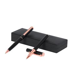 Presentset med kulspetspenna och rollerpenna med roséguldfärgad design